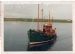Flourish approaching Shapimsay Pier