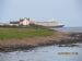 Queen Elizabeth passing Brough in South Ronaldsay